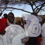 Maasai receiving their bed nets
